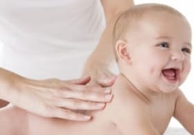 Ease Growing Pains with Infant Massage