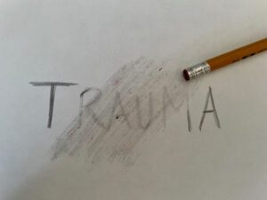 the word trauma being erased